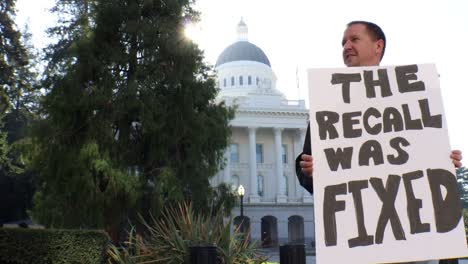 man protesting recall election at california state capitol