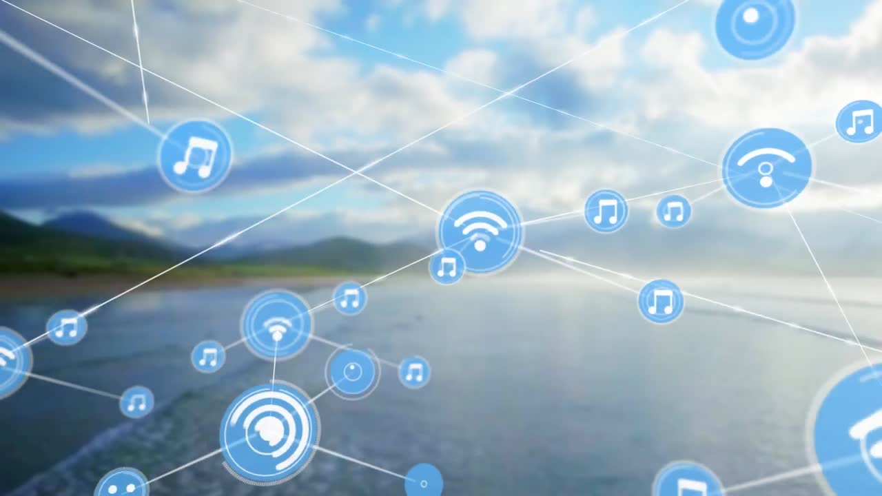 animación de una red de iconos digitales contra una vista aérea de la playa y las nubes en el cielo azul