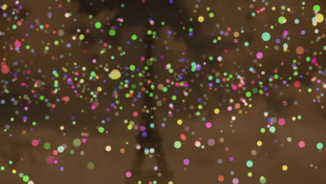 animación de multicolores manchas parpadeantes de navidad sobre la torre eiffel en el fondo
