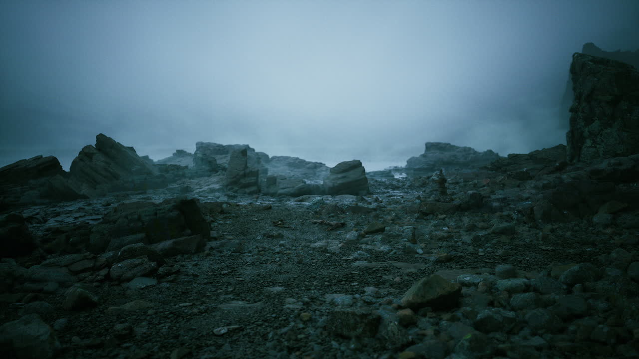 Stormy coastal scene chilly dusk over rugged shoreline with waves