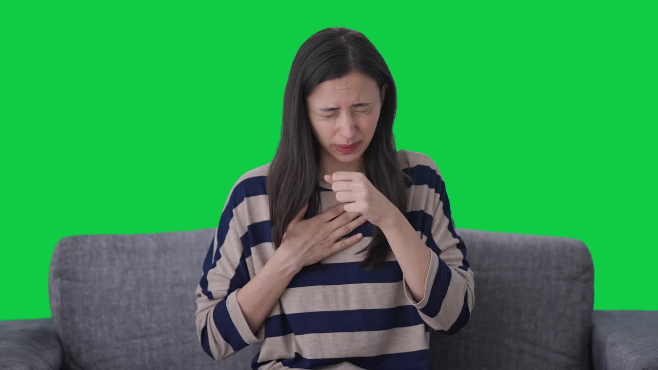 chica india enferma que sufre de problema de acidez pantalla verde