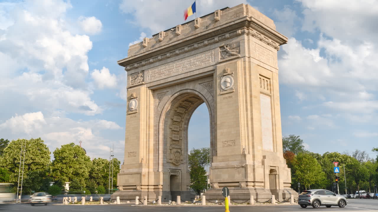 Time lapse of cars moving near the Triumphal Arch of Bucharest, Romania