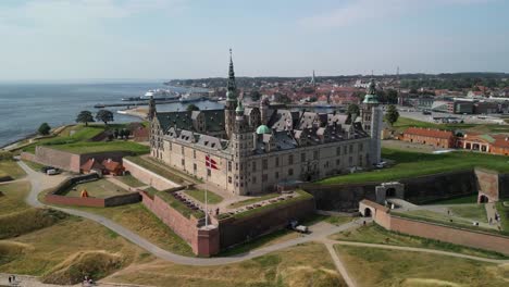 kronborg castle - drone far pan with danish flag