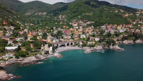 a colorful italian coastal town overlooking the mediterranean sea, aerial view
