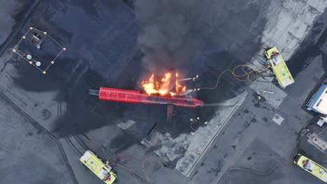 brave firefighters take on blazing fire on dummy airplane during training