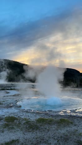 yellowstone geyser at sunset