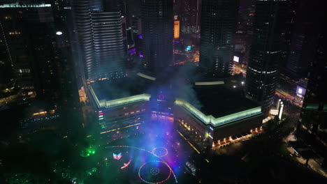 independence day light show at suria klcc, night in kuala lumpur - aerial view