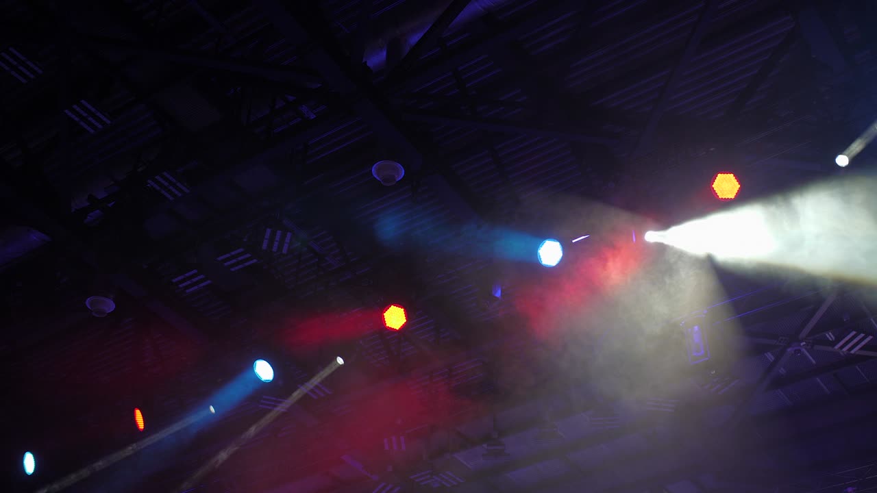 Multicolored spotlight of scene lights in the dark