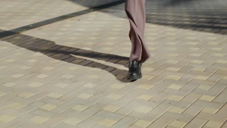 person walking on pavement