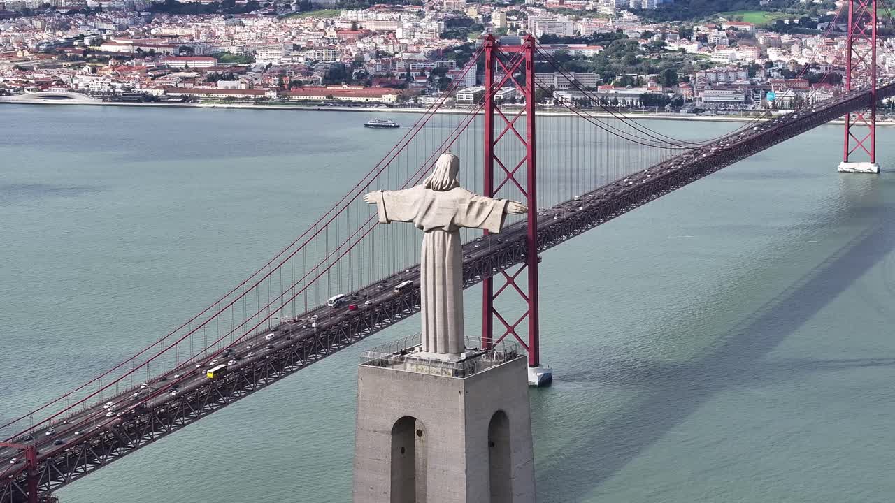 Christ The King At Lisbon In Lisbon District Portugal. King Christ Statue. 25 Of April Bridge. Christ The King At Lisbon In Portugal. Tejo River Coast. Landmark Church. Portugal Skyline.