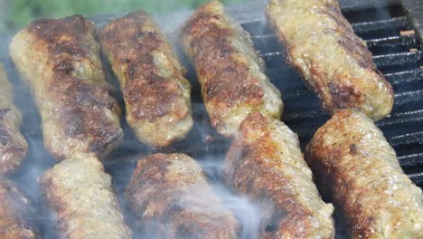 traditional food meat balls "mici" on grill