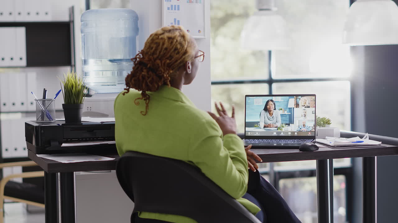 Woman on video call in office setting