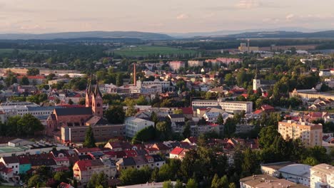the city of svitavy from a drone. churches and historical buildings along with an industrial district and residential houses