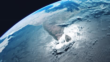 india and sri lanka from space with earth slowly rotating with view from orbit with dynamic clouds sea atmosphere and strong sun reflection on indian ocean sea and bay of bengal