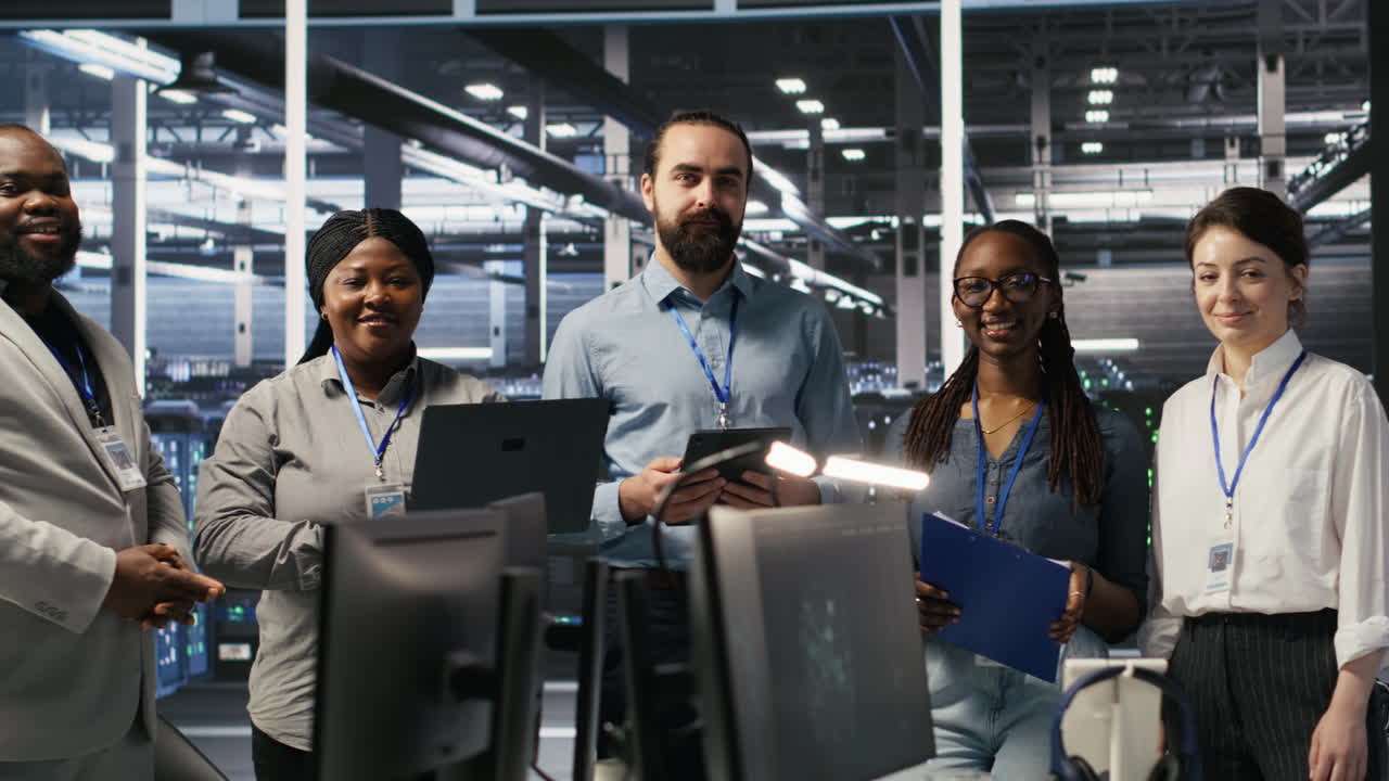 Vertical video Happy data center engineering team collaborate on neural network implementation