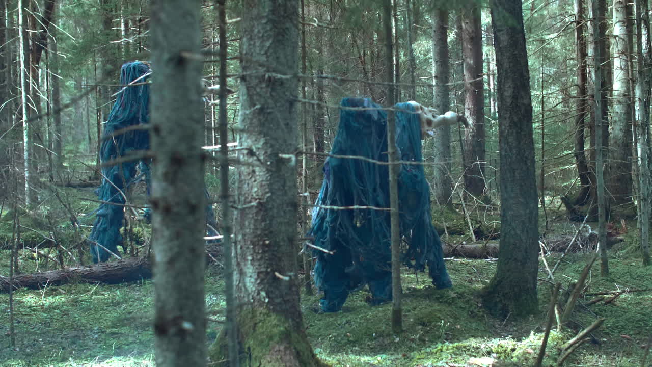 Mysterious monsters with long legs running around forest. Fantastic beasts