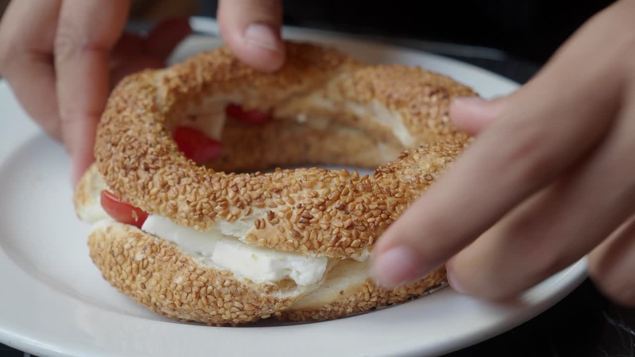 Simit with cheese and tomato