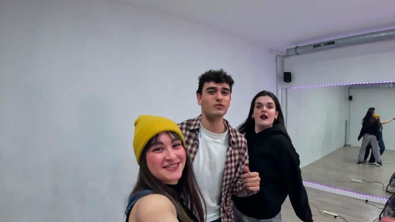 Group of friends dancing in a studio