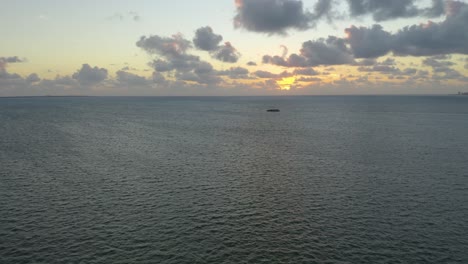 Aerial-View,-Boat-Crosses-Frame