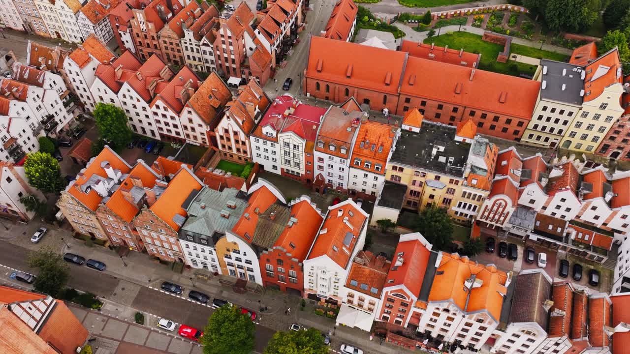 Top down aerial, Elblag Old Town Poland with red rooftops, narrow streets