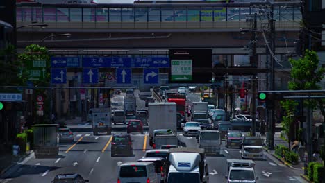 a timelapse of the traffic jam at the urban street in tokyo long shot