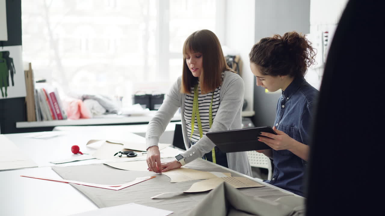 Two Fashion Designers Working on a Pattern