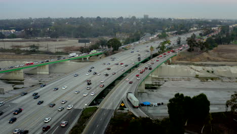 aerial view of heavy traffic on a multi-lane highway at dusk
