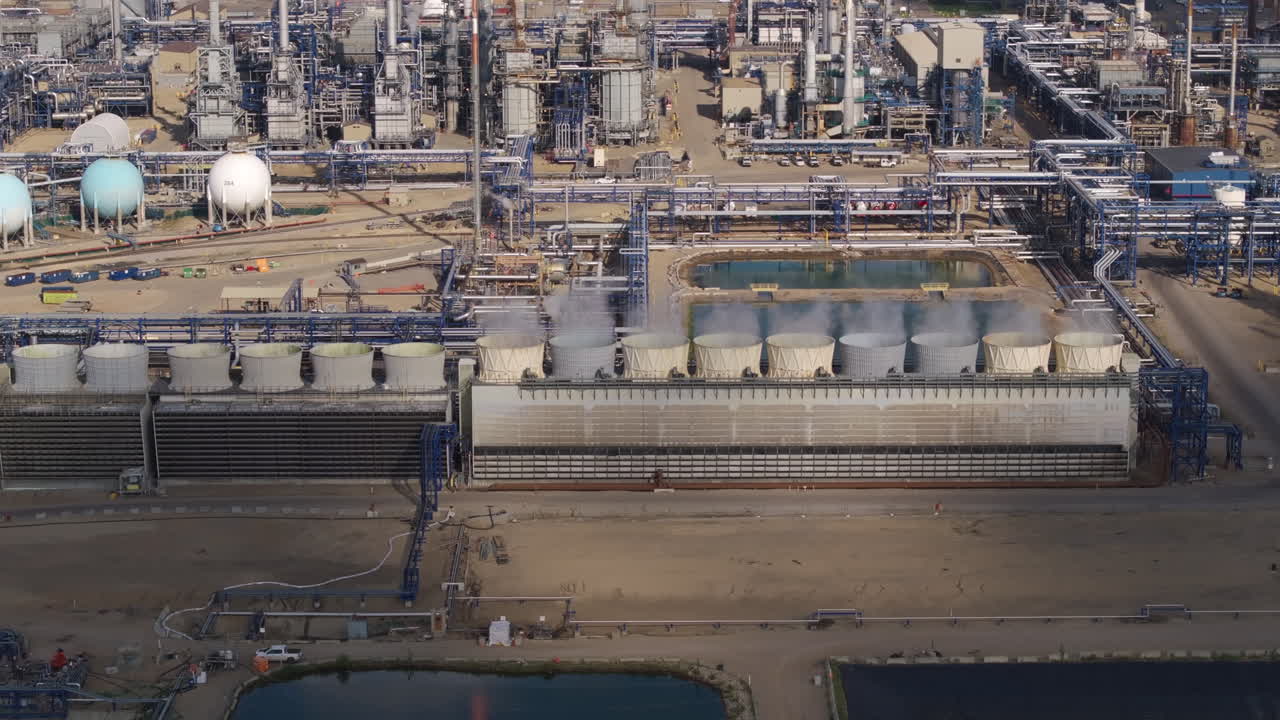 Aerial view of an industrial facility with tanks and buildings