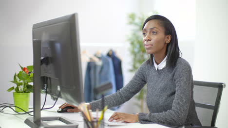 young female professional working at desk 1