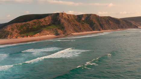 Aerial:-The-surf-beaches-of-Cordoama-and-Castelejo-in-the-Algarve,-Portugal