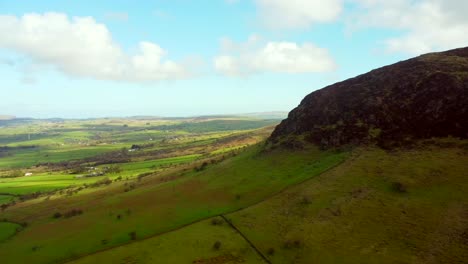 aerial shot of slemish mountain, situated in broughshane, county antrim in northern ireland