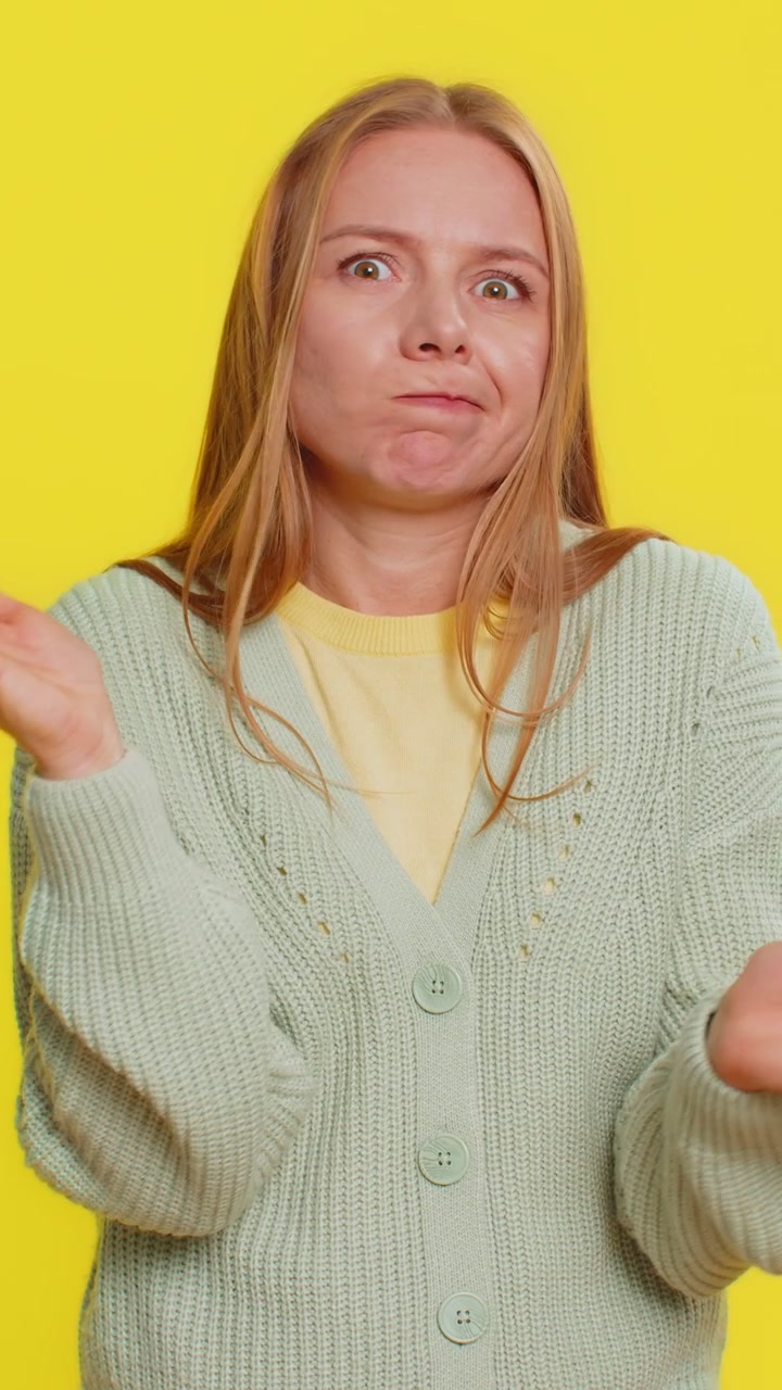 Confused woman feeling embarrassed about question having doubts no answer clueless uncertain