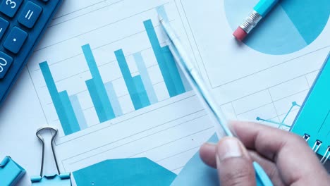 business documents with charts and graphs