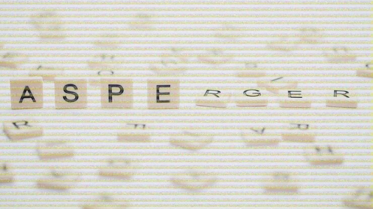 Asperger written on white squares