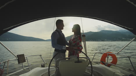 couple enjoying a sunset sailing cruise