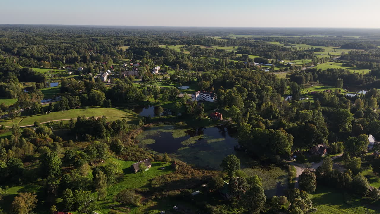 Nitaure Parish (Aerial Establishing Shot) Above The Beautiful, Green, Baltic Countryside Of Latvia, Europe.