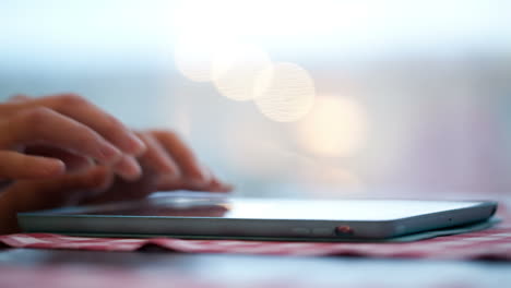 woman typing on touchpad