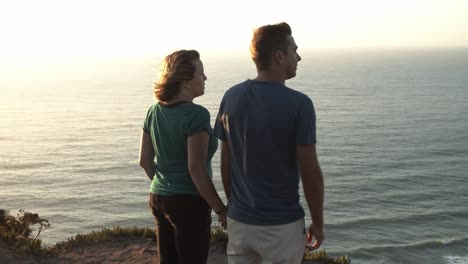 married couple of tourists relaxing outdoors