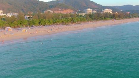 aerial view of a tropical beach with tourists