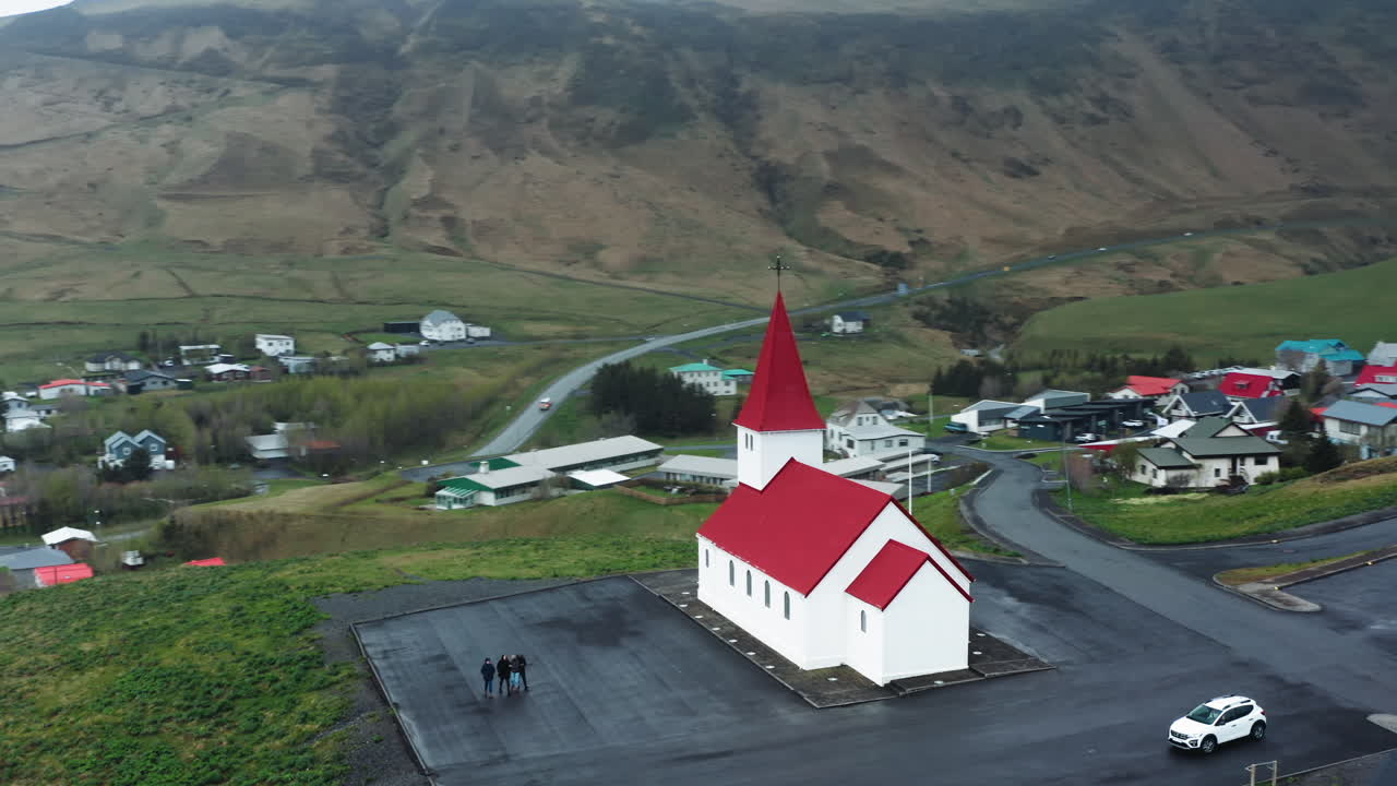 Aerial drone shot of local Church in V&iacute;k &iacute; M&yacute;rdal, South Iceland
