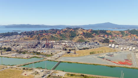 large industrial dutra materials complex along the coast of the san francisco bay - aerial view