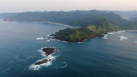 Lush-and-jagged-coast-near-Menganti-beach-in-Kebumen,-Indonesia