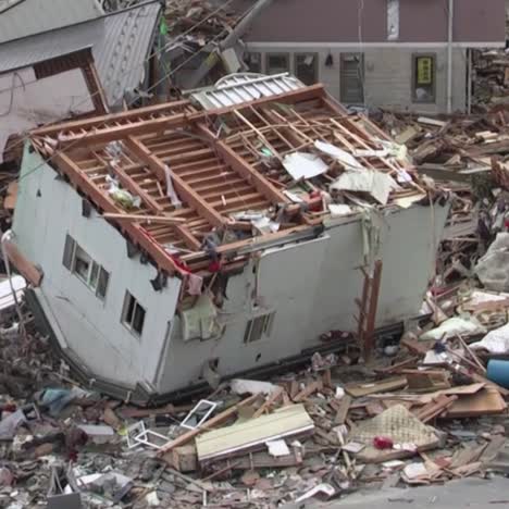 search and rescue teams hunt for survivors following the devastating earthquake and tsunami in japan in 2012