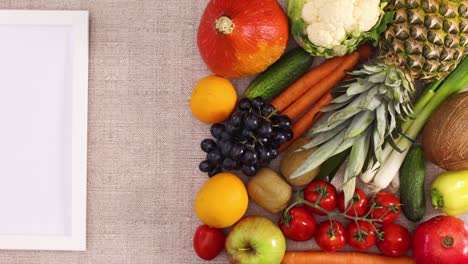fresh fruits, vegetables and frame for logo or text appear on theme. stop motion