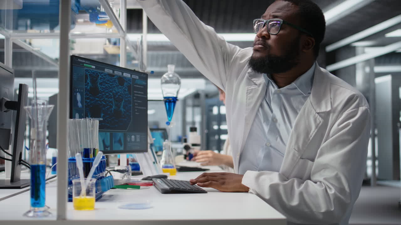 Vertical video Scientist in laboratory interprets clinical blood values on computer