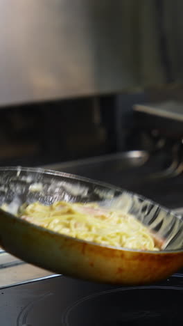 cooking pasta carbonara
