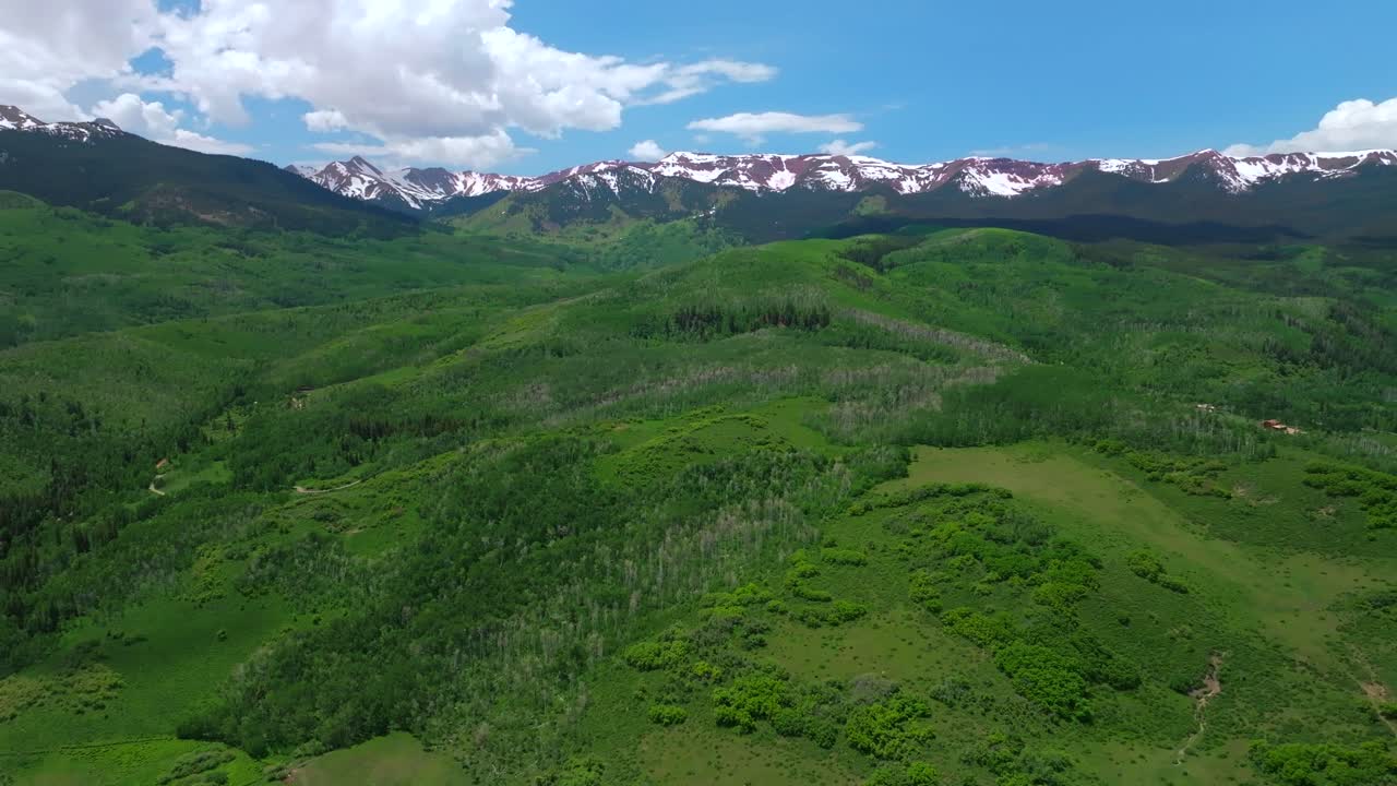Capitol Peak 14er Wilderness spring summer aerial drone parallax Colorado Aspen Snowmass Elk Rocky Mountains Range Capitol Creek rd Trailhead Aspen grove White River Forest snow fields circle right up