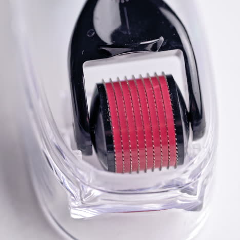 dermaroller for medical micro needling therapy. tool also known as: derma roller, mesoroller, meso-roller, mesopen.