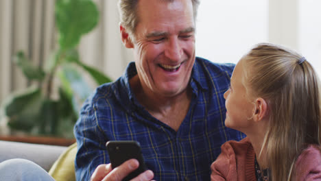 Grandfather-and-granddaughter-spending-time-together-