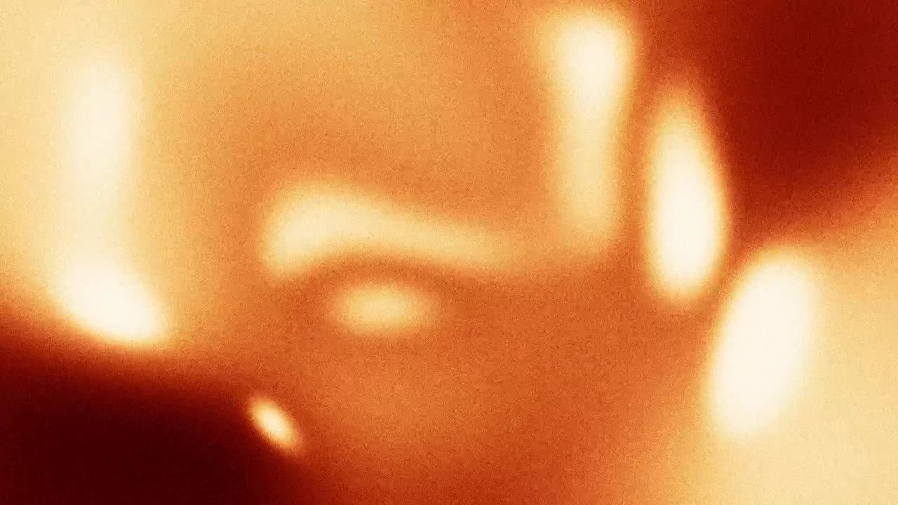 Abstract Warm Light Leaks with Grainy Film Texture